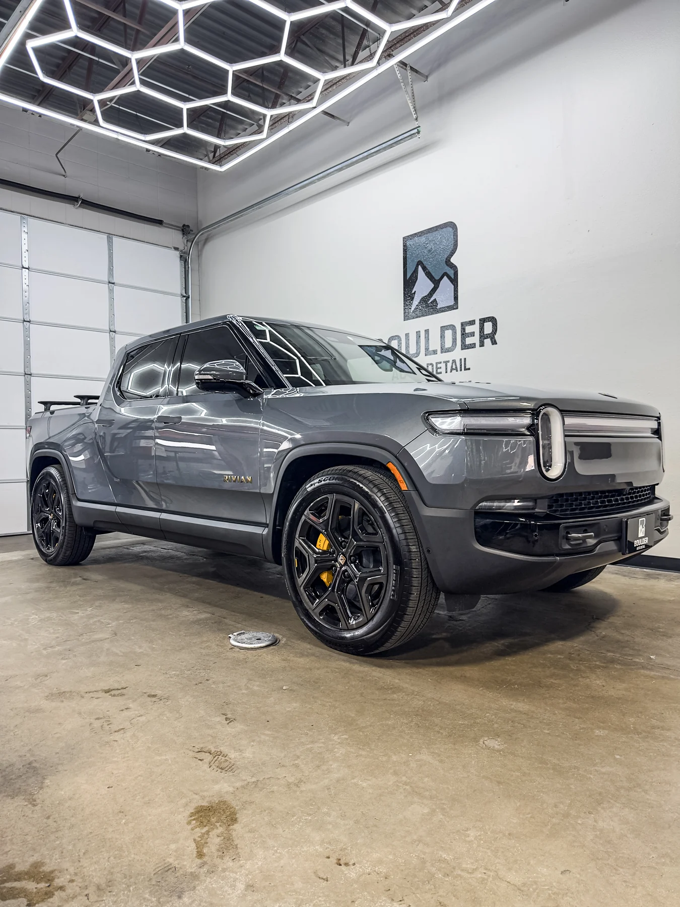 Gray Rivian photographed inside Boulder Auto Detail